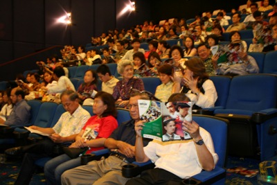 Viewers in the cinema hall before screening of 