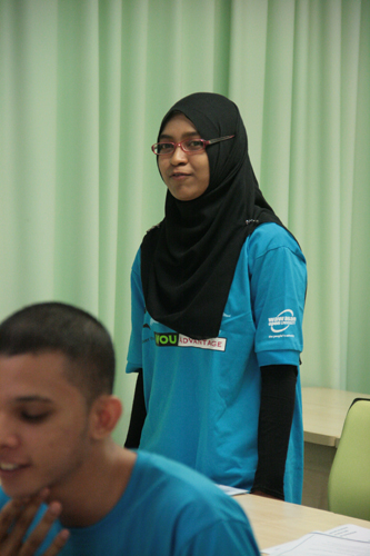 Fatin introducing herself during the orientation.