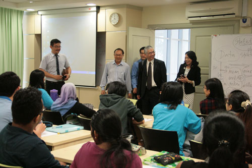 The delegation drop in on a lecture in progress for the full-time students.