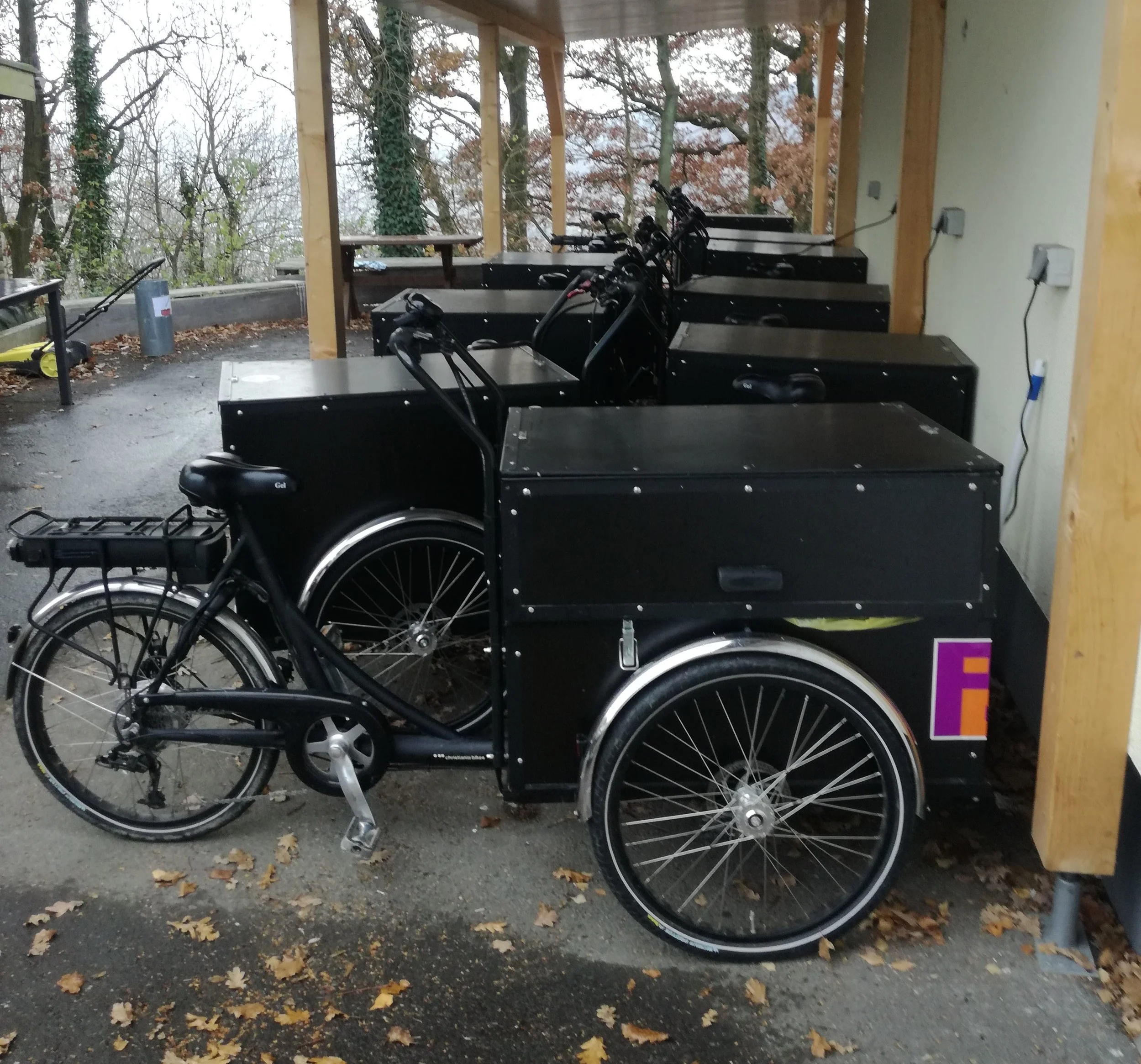So called “Christiania Bikes” with electric motors are used for the housekeeping in two of the ten parks in Germany