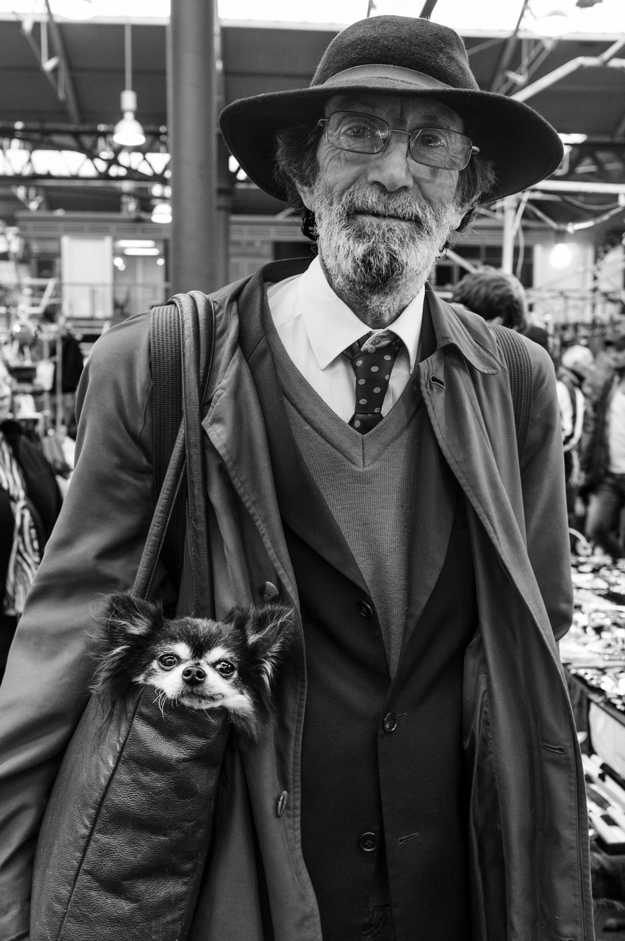 MAN WITH A  DOG IN HIS  BAG.jpg