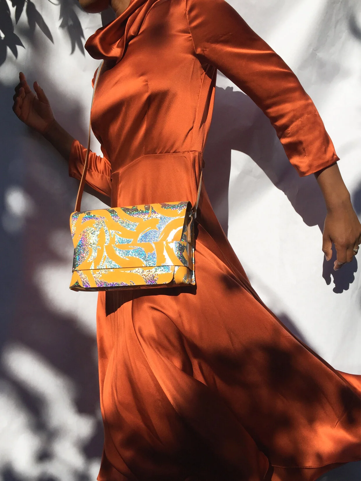 3 Joanna Vanderpuije screenprinted shoulder bag silver orange print sparkle.jpg