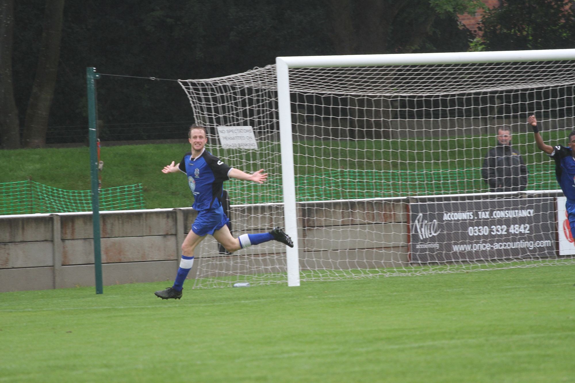 Mike Sherrington wheels away in delight after putting Cheadle 1-0 up