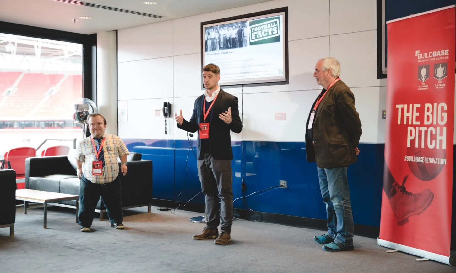 Craig Brennan (centre) with committee members Stuart Crawford and Brian Lindon during the presentation day at Wembley Stadium.