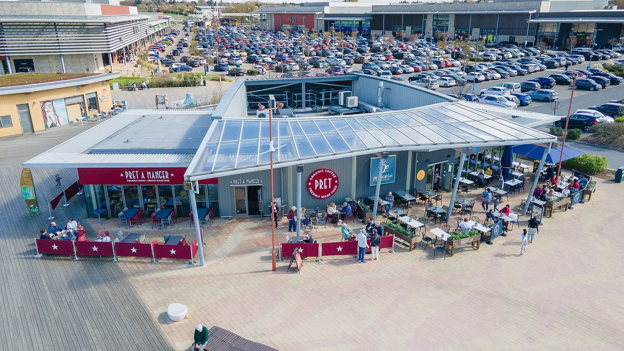 See your business from a whole new perspective.
Drone photography gives you more than just a nice shot &mdash; it tells the full story. From showcasing your location and footfall to capturing the energy around your brand, aerial visuals instantly ele