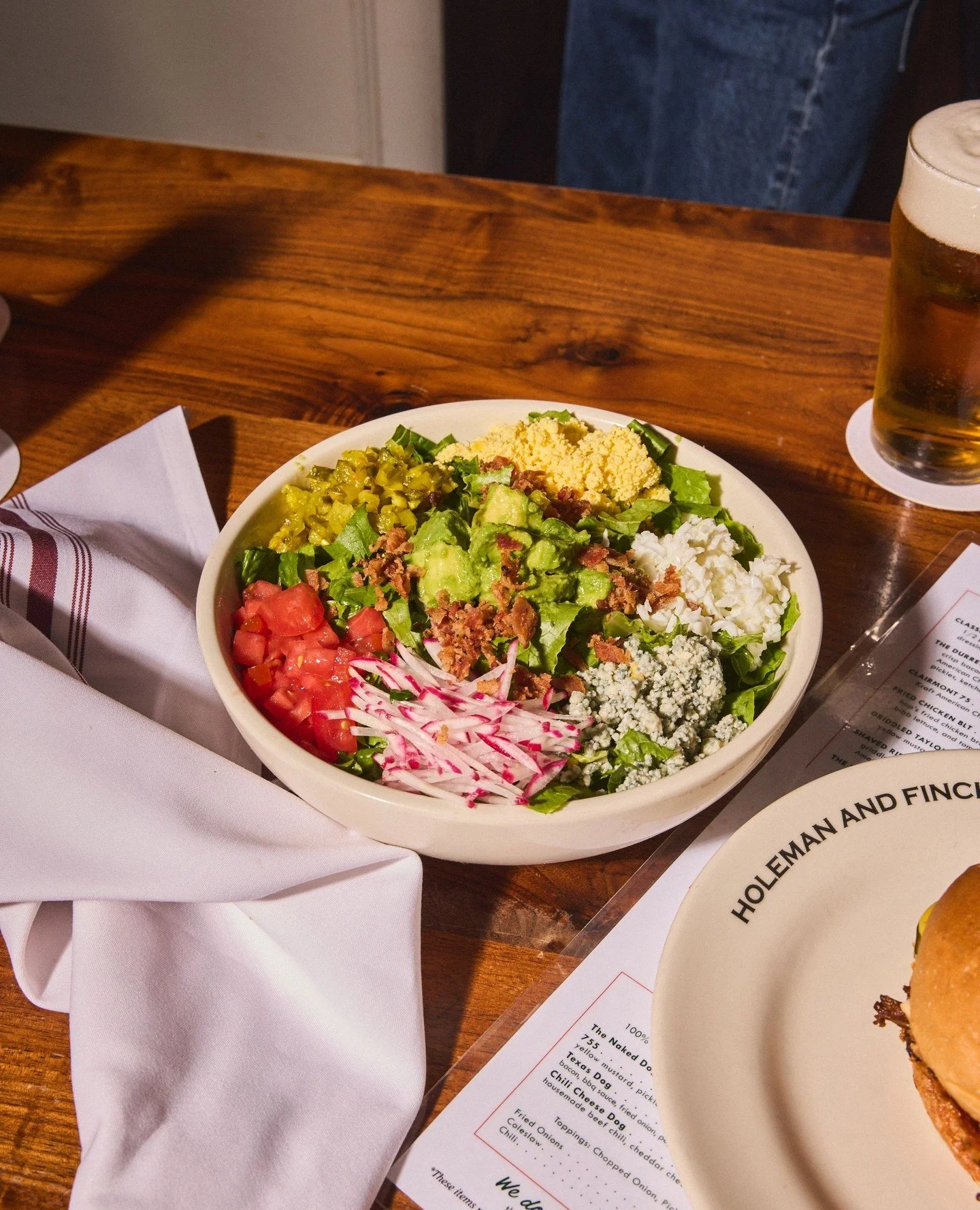 Our idea of eating your greens. The H+F Chopped Salad with romaine, tomato, avocado, grated egg, blue cheese, chopped B&amp;B pickles, radish, bacon and Lorenzo dressing.