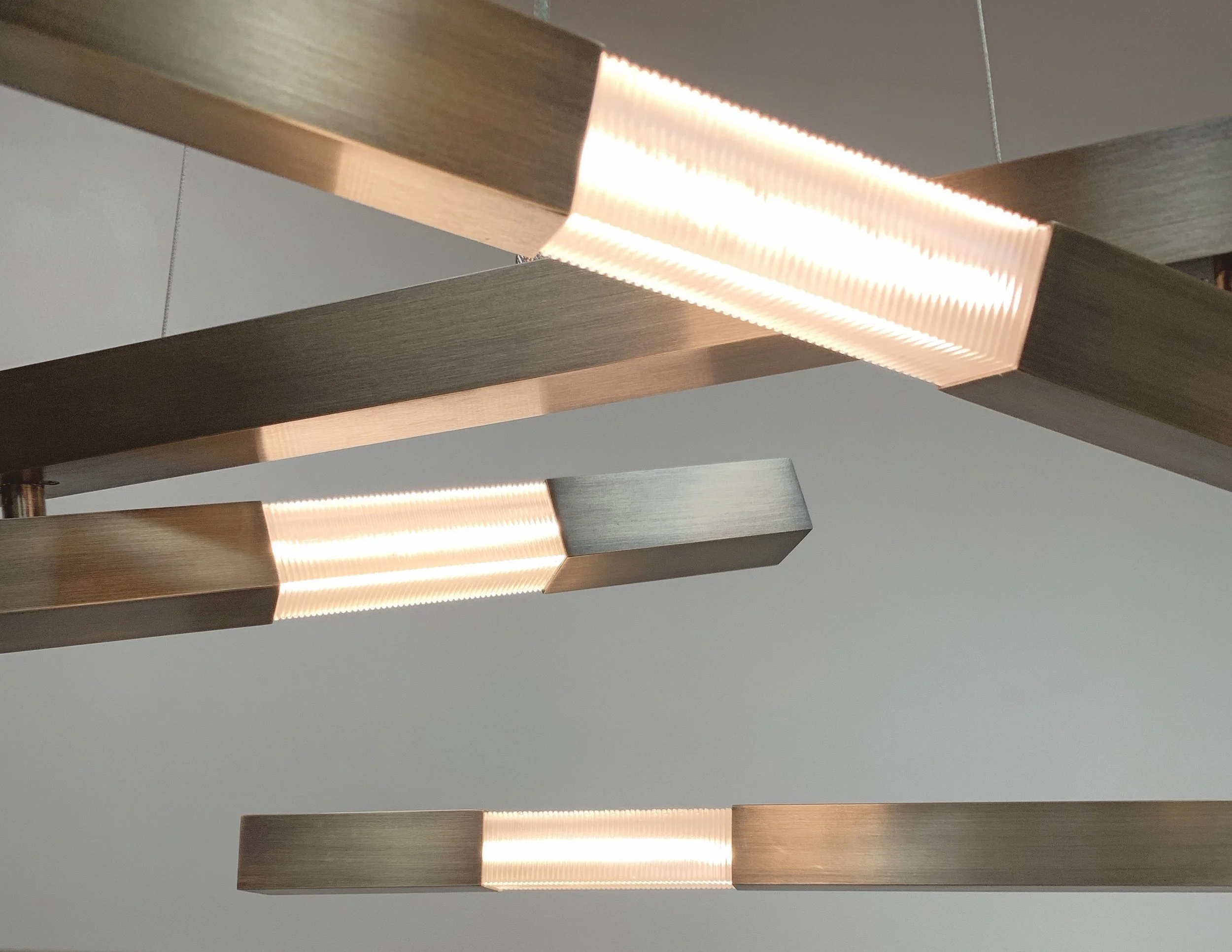 Custom modern light fixtures in brass