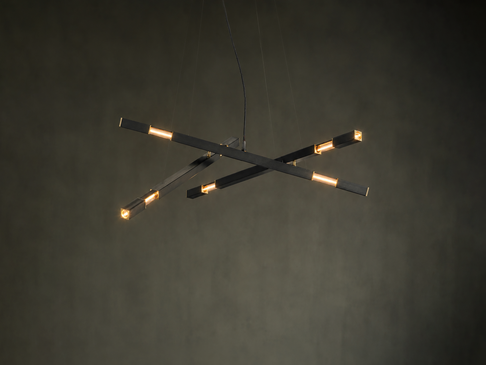 Daikon+Studio+Dynamic+Chandelier+3+br+dark+wall+%281%29.png
