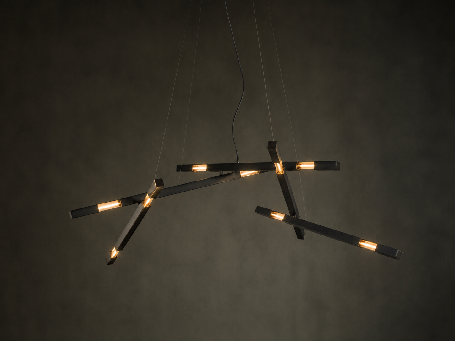 Daikon+Studio+Grand+Dynamic+Stilk+Chandelier+Bronzed+Brass+Grey+Wall.png.webp