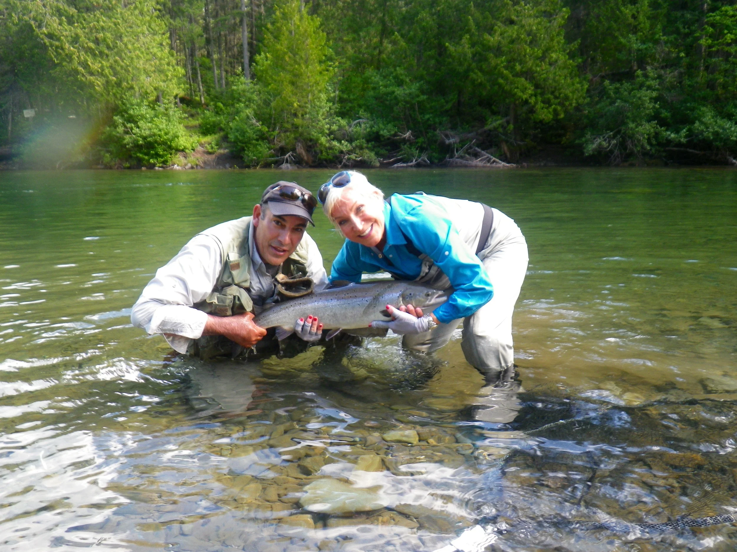 Barbara Crook and Salmon Lodge guide Reg Cyr put a nice one back, congratulations Barbara!