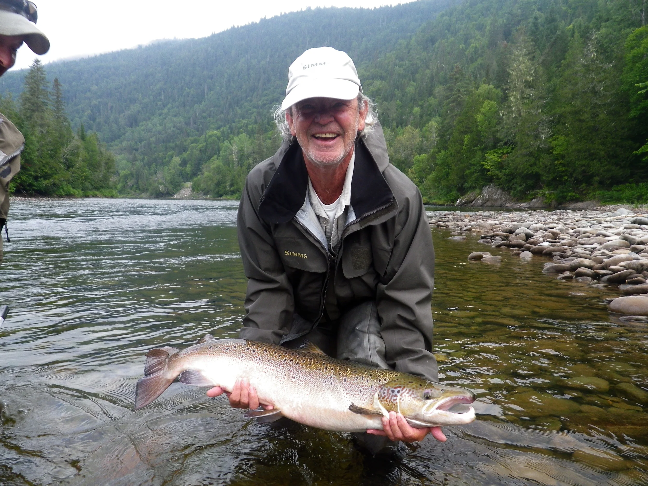 Rene Wilhelm with a nice Grand Cascapedia fish, Congratulations Rene!