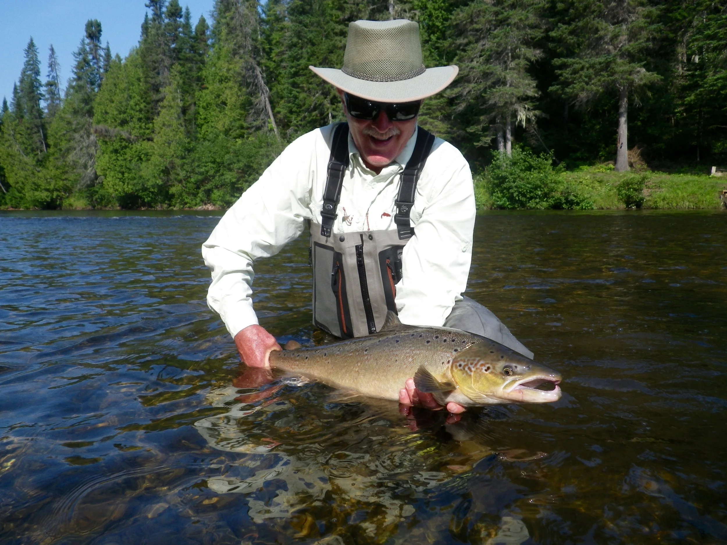 Nick Brock with his first salmon from the Grand Cascapedia, nice one Oscar!