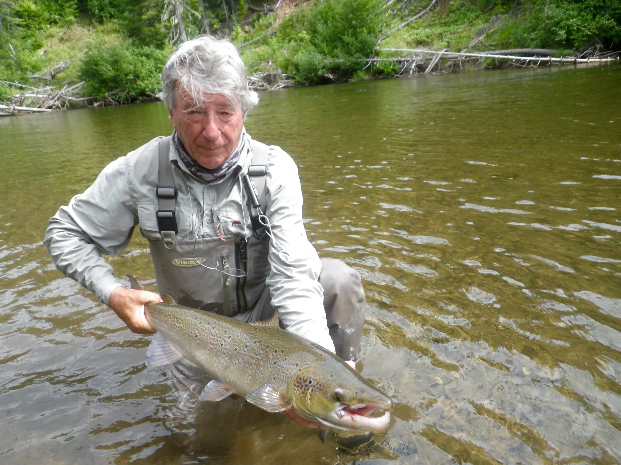 Rolf Weiresmuller realeases a nice salmon back to the Grand Cascapedia, Nice one Rolf!