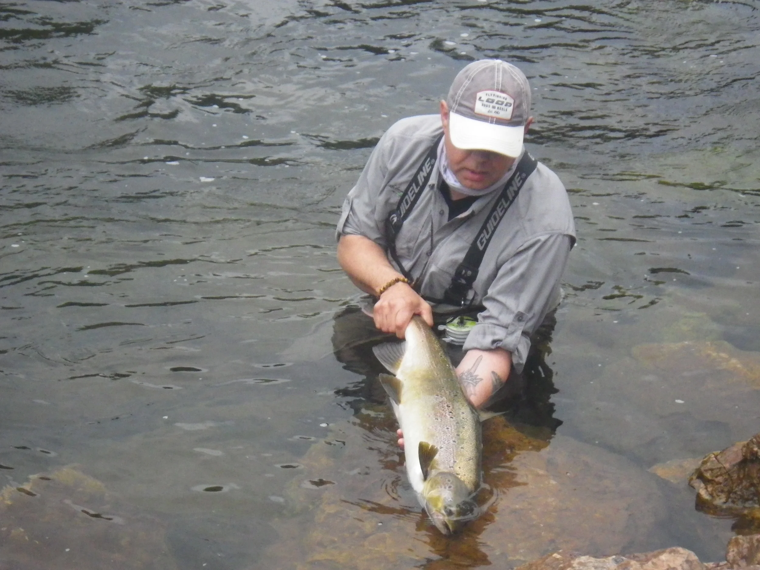 Hilmar Hannson from Iceland with his first North American Salmon, Nice on Hilli ! 