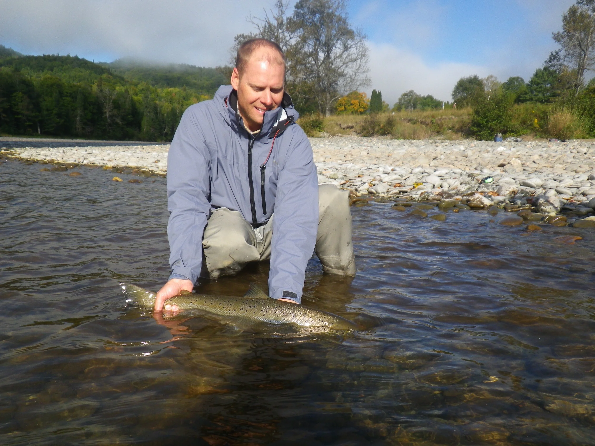 Salmon Lodge regular Jim Peterson releases one back to swim another day, Congratulations Jim!