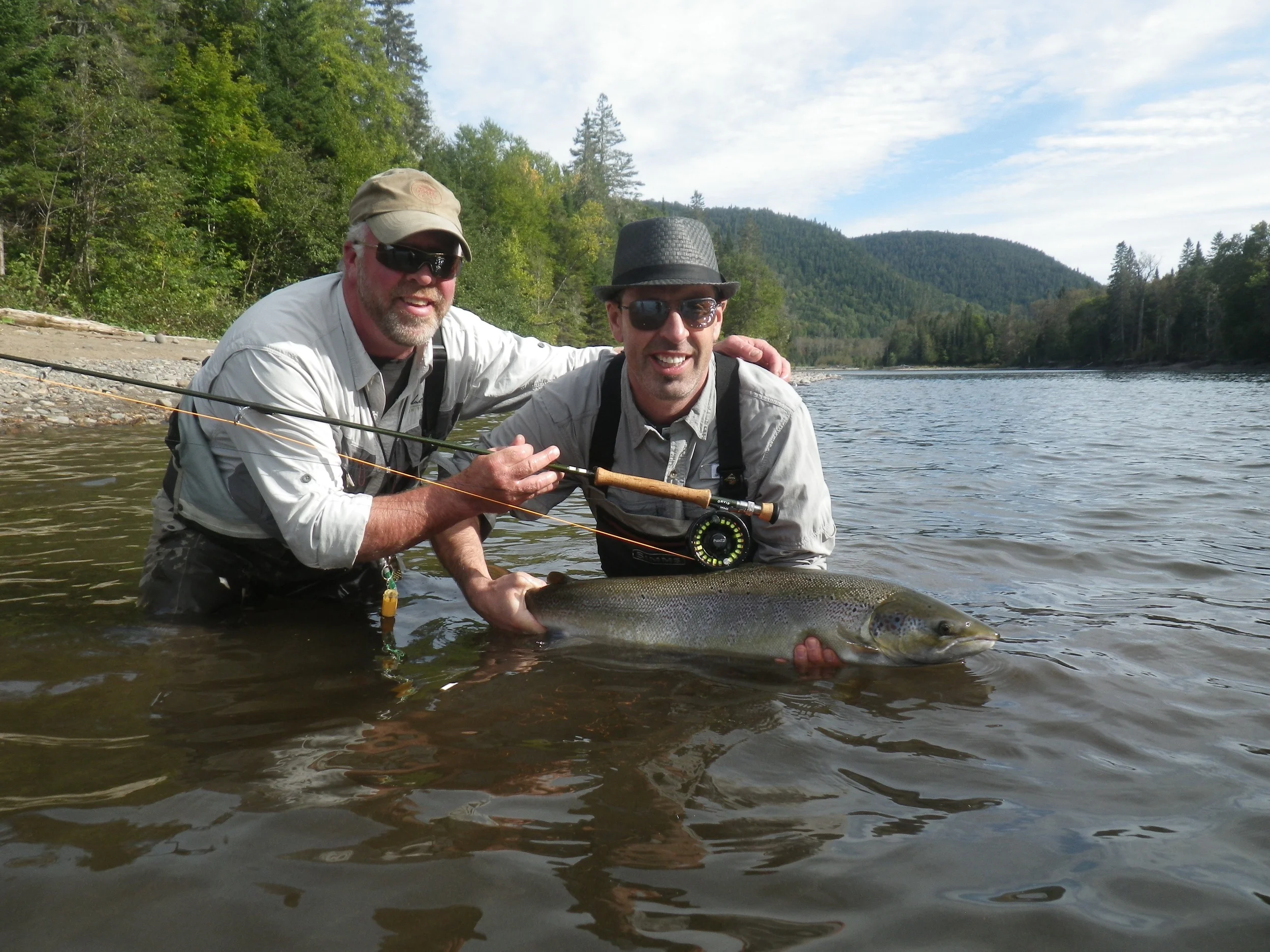 Jeff McDonald and Salmon Lodge Guide Larry put one back on the Grand Cascapedia, nice salmon Jeff!