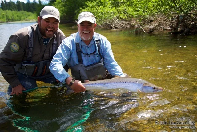 Jim Lawley lands a nice on on the Grand Cascapedia, Nice fish Jim!