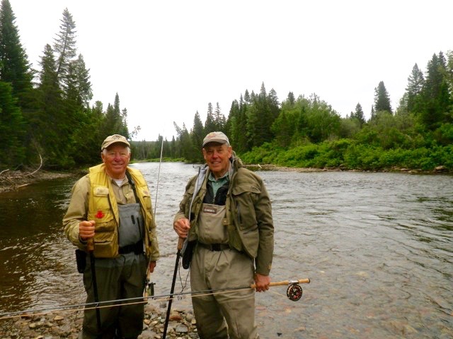 Long time fishing buddies Dave Oxley and Davis McFarlane get ready for another day on the river.