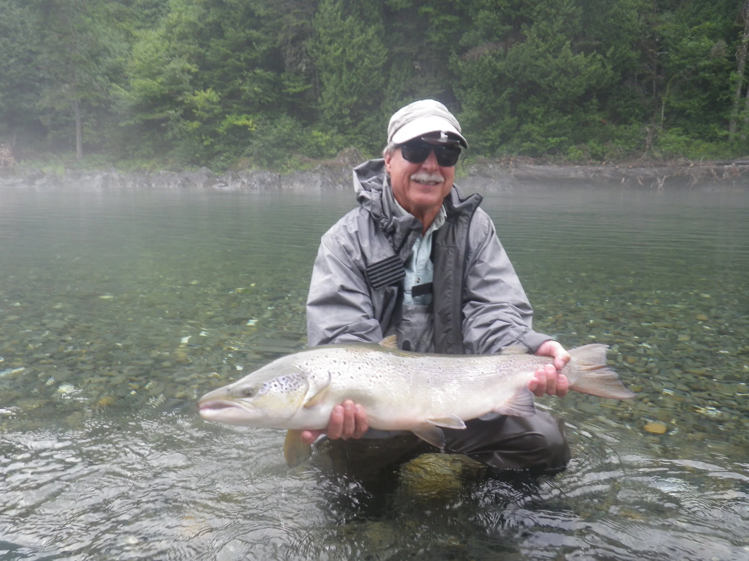 Steve Saunders lands his first salmon of the trip, Congratulations Steve!