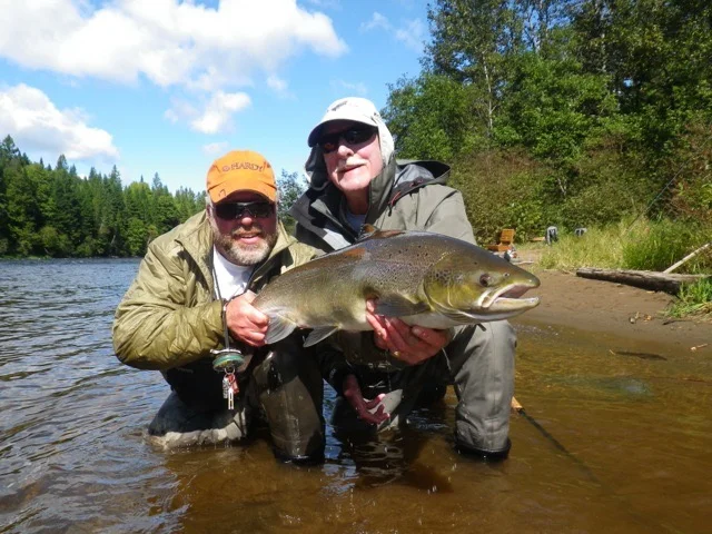 Richard Verney (Right) and Salmon Lodge guide Larry Dee with a nice fall salmon, congratulations Richard!