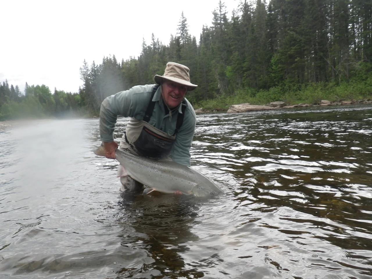 Salmon Lodge regular Claude Berger with a nice big Grand Cascapedia salmon, congratulations Claude!