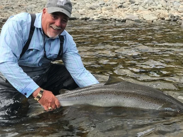 Jim Lawley releases this fine salmon back to the Grand Cascapedia, Nice one Jim!