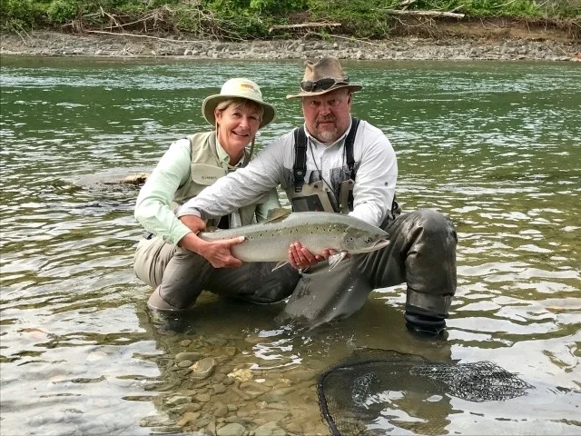 Jeannie Pelletier with Salmon Lodge guide Yvan Bernard, nice Bonaventure salmon Janice!