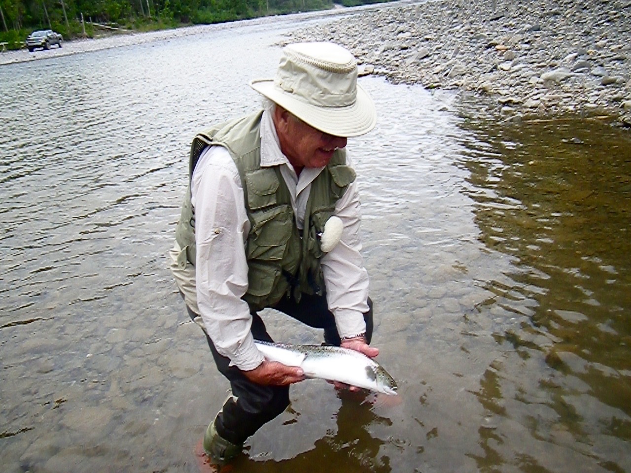 Andre Bombardier releases a fresh run grilse on Baker pool, nice one Andre, congratulations!