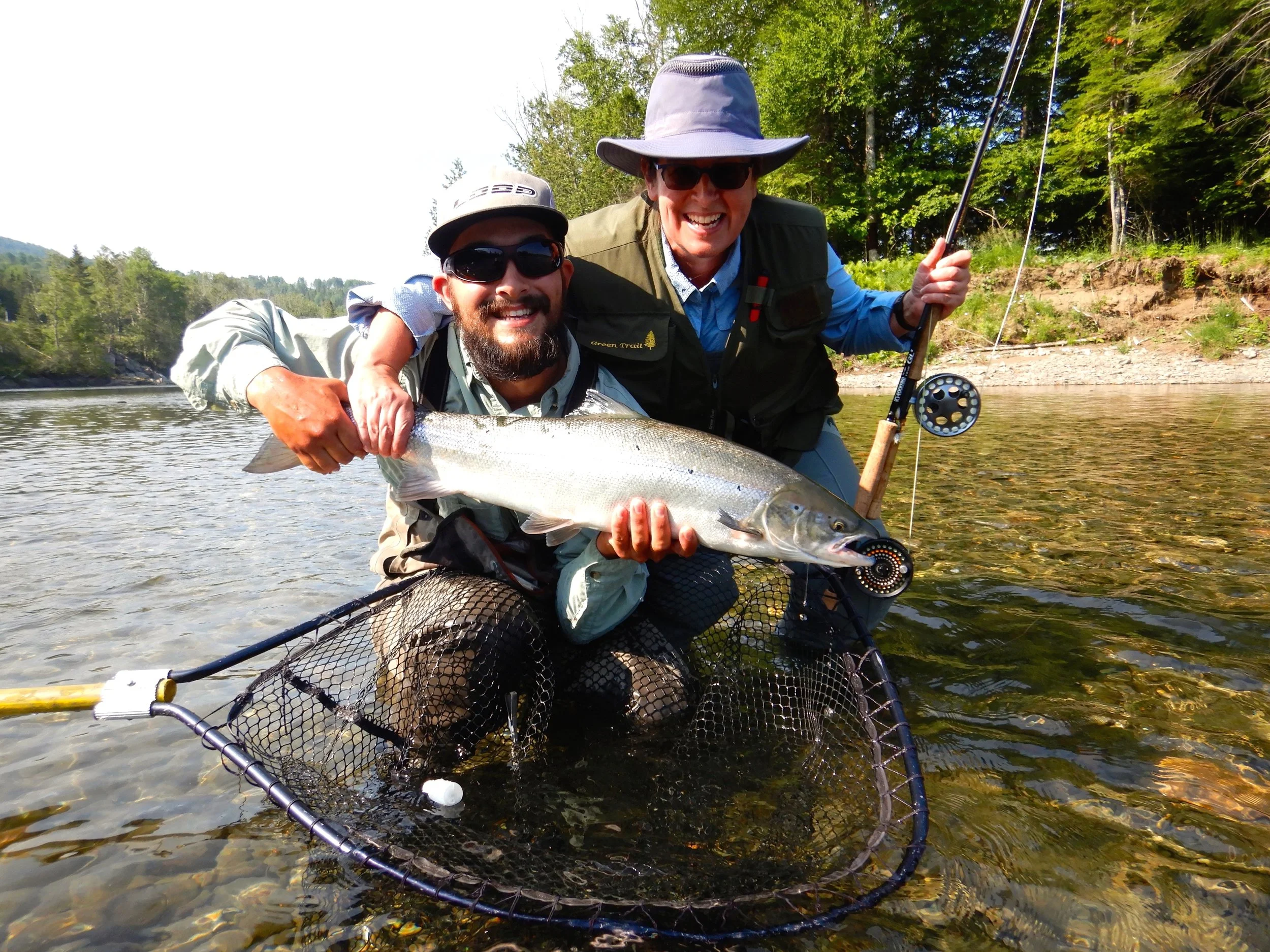 This was Marie France Langlois's first time salmon fishing, the first day she landed three!!! here she is with Salmon Lodge guide Clement Bernier. Way to go Marie France and Clement!