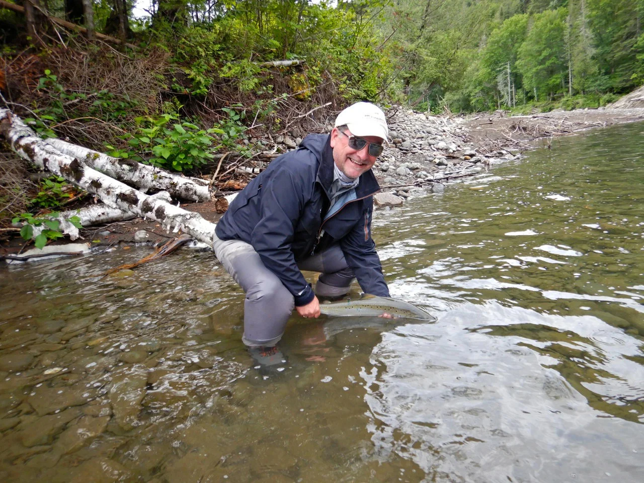 Our good friend Marcel Prouxl releases his first grilse back into the Petite Cascapedia!