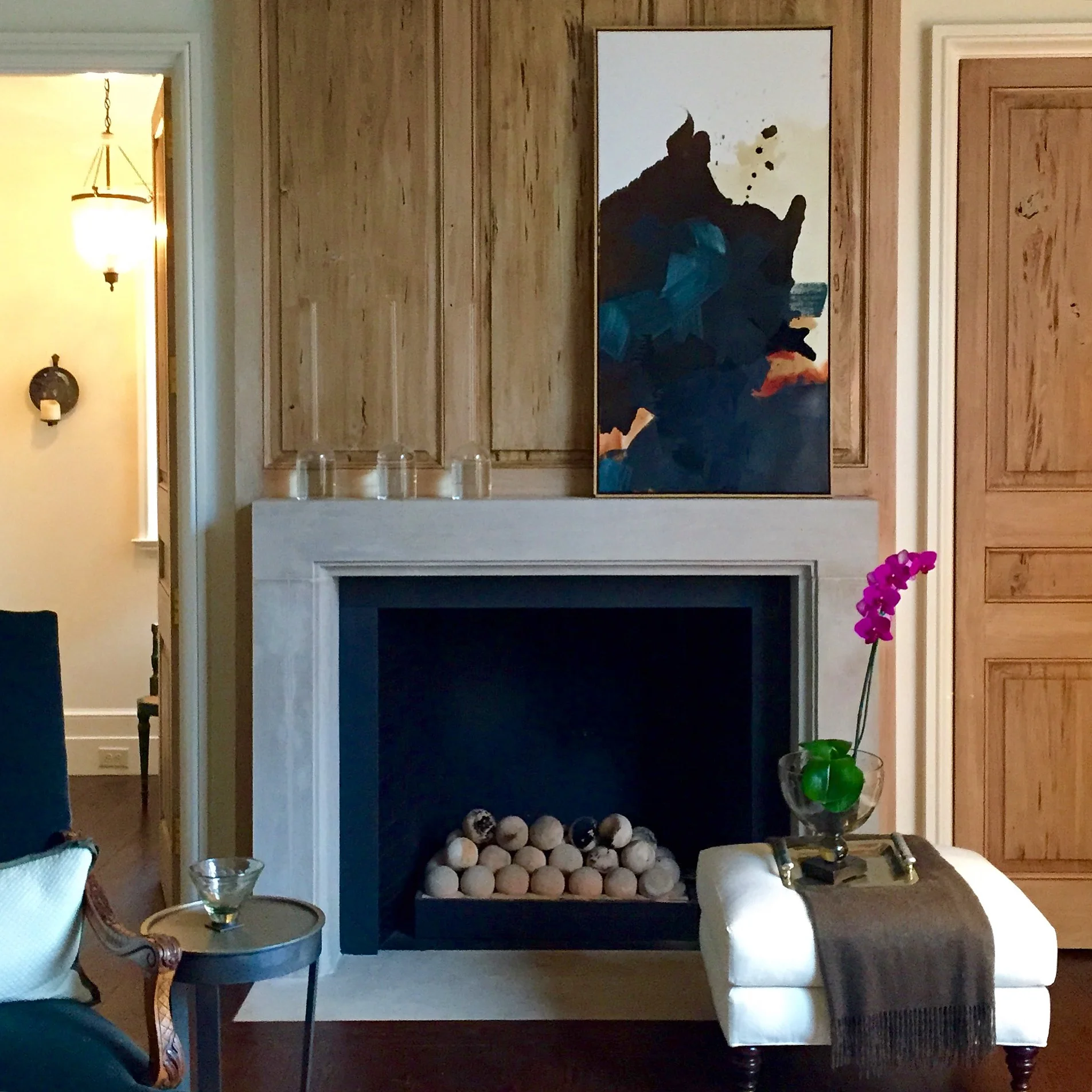 commissioned piece to pull the color in the mohair chair into the room.