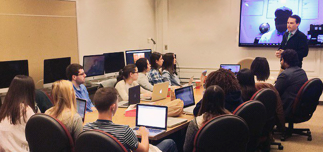 Undergraduate students at Syracuse University's #1-ranked S.I. Newhouse School of Public Communications collaborating with Newhouse alumnus and Global Social Enterprise Institute President W. Michael Short on the launch of SourceFunding.org™ (Photo Credit: Chloe Buccina)