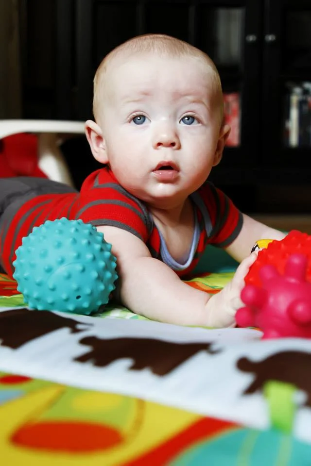 One of the things that I love most about Hudson is his face. I know that sounds dumb. But he has the most wonderful, pensive expressions. Here, he was happily playing and then, all of a sudden, he looked toward the window in the living room. He looked over at it as if he was just figuring out all of the pieces. He still gets this face when he is working on something.