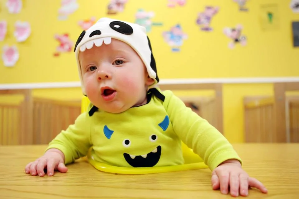 Hudson's first Halloween. We arrived at his daycare to see their costume parade, and Hudson was holding court (as he tends to do). David and I decided not to dress him in a costume, so he has on a little monster onesie and a skeleton hat. Clearly a new parenting decision moment. I love that even so early, he had swagger. 