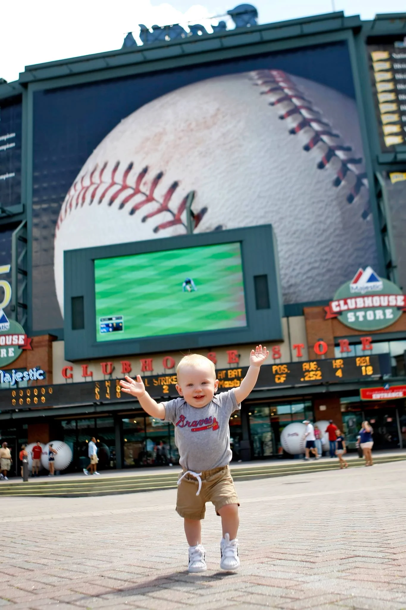 Hudson's first Braves game. And look at this face. Hudson had - and still has - so much joy. Hudson really soaked in the atmosphere as we wandered through most of the public areas of Turner Field. I love watching David and Hudson spend time together, but seeing the two of them share this experience made this a day that I will always cherish.