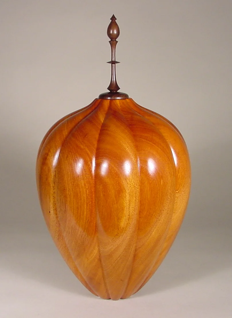 Carved vessel by Avelino Samuel