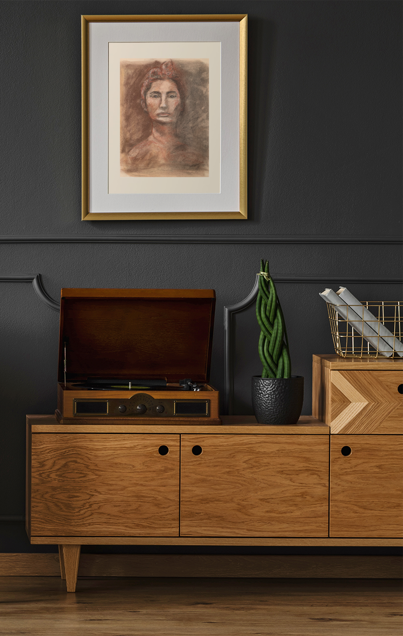 mockup-of-an-art-print-with-a-golden-frame-hanging-in-a-modern-living-room-36957-r-el2 copy.png