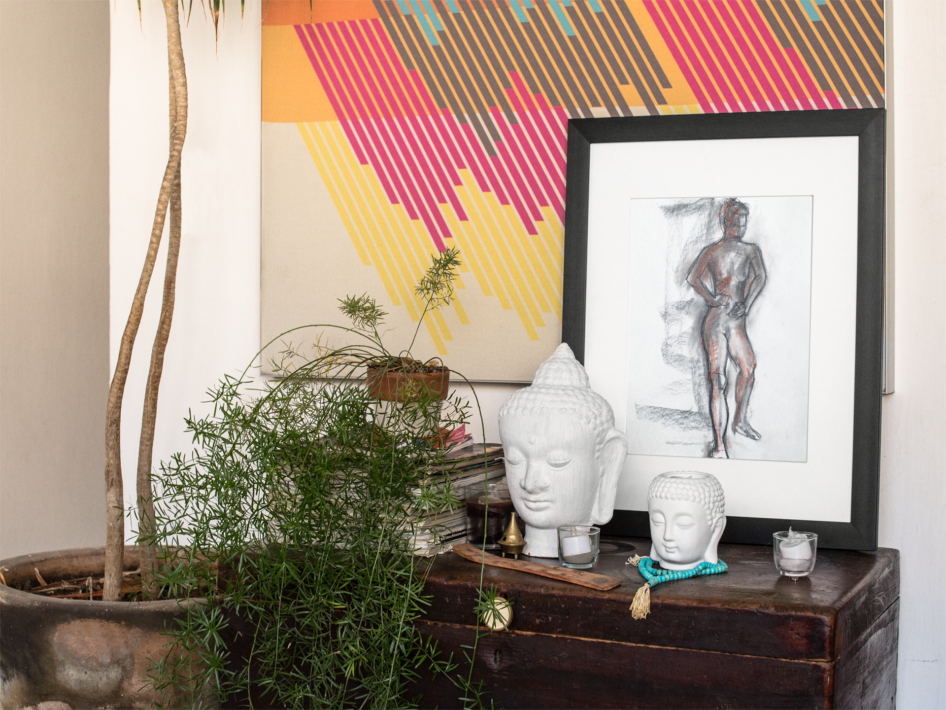 framed-art-print-template-on-a-table-with-decorations-near-a-plant-a14774.png