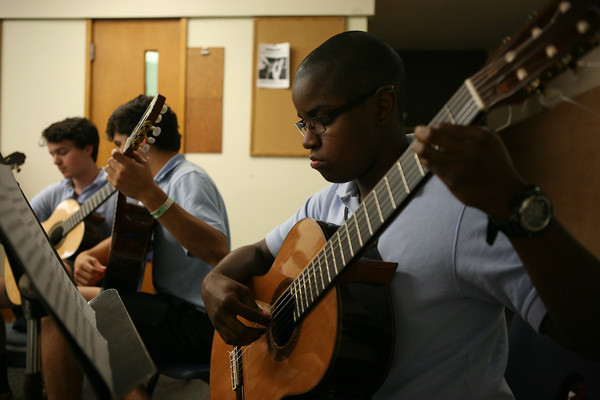 Ciyadh assisting with the Interlochen Arts Camp guitar ensemble in 2013. She worked at the camp as a stage services member and also played with the Interlochen Arts Camp Guitar Ensemble during the summer of 2013. 