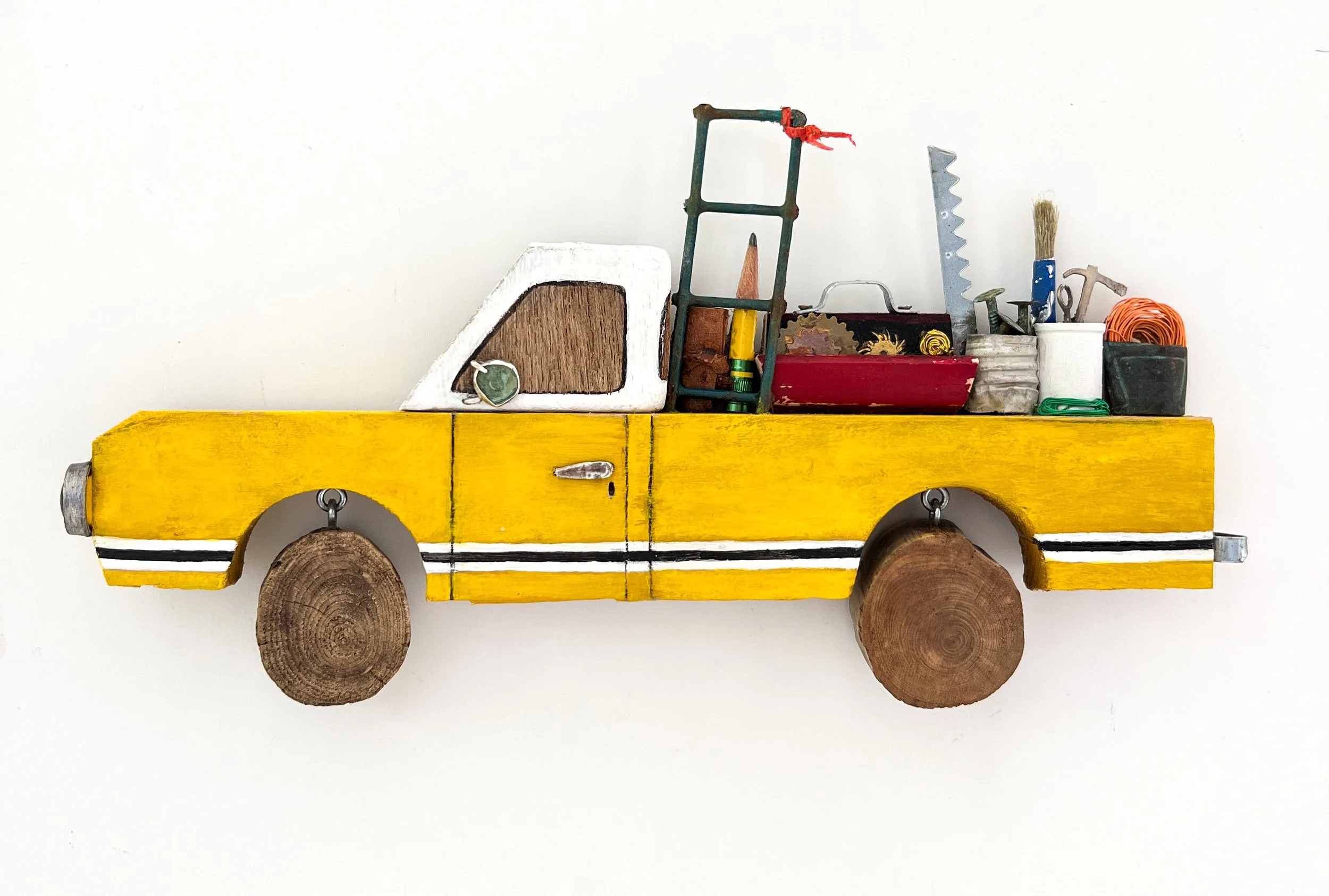 The Carpenter’s Yellow Truck 