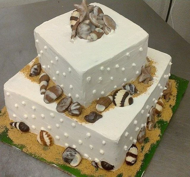The Beach cake! #cakes #cakes #weddingcake #chocolateseashells #chocolate #ediblesand #localeats #viptreatandsweets
