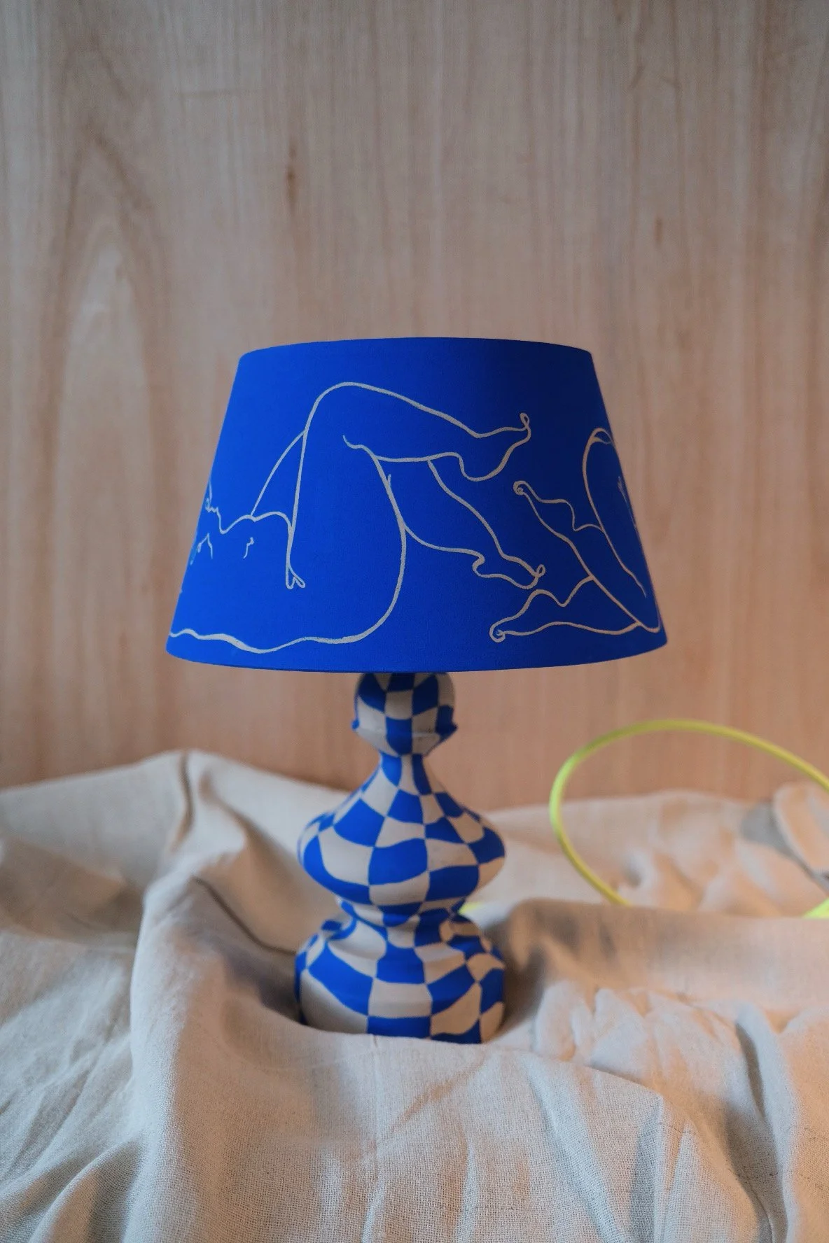 Women intertwined 01--Painted upcycled wooden lamp base with painted lamp shade Shade_ 30cm wide x 18cm high Lamp base_ 30cm high x 12cm wide, height with shade_ 42cm-2023-900-Partnership Editions.jpeg