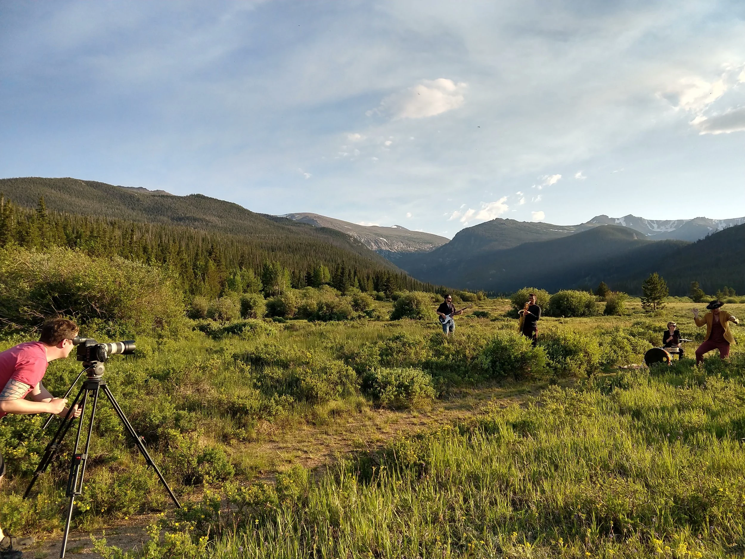 Videographer Charles Kelly filming a meadow dance off.