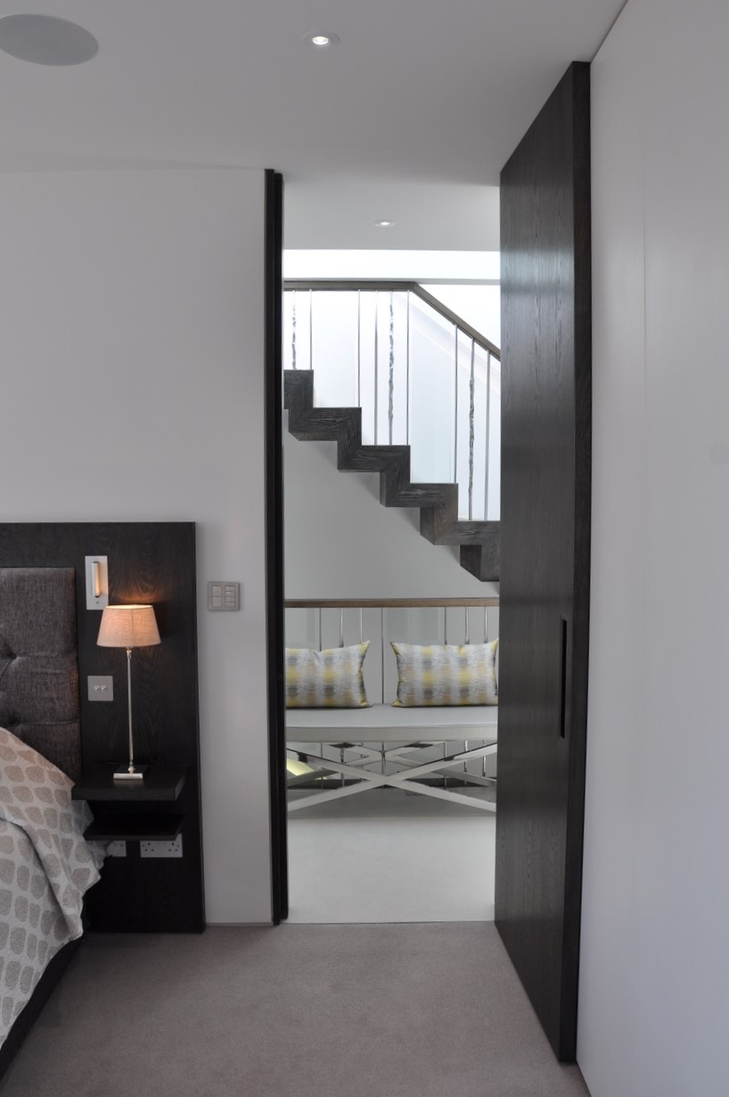 Hallway, full of natural light during the day with simple control at night