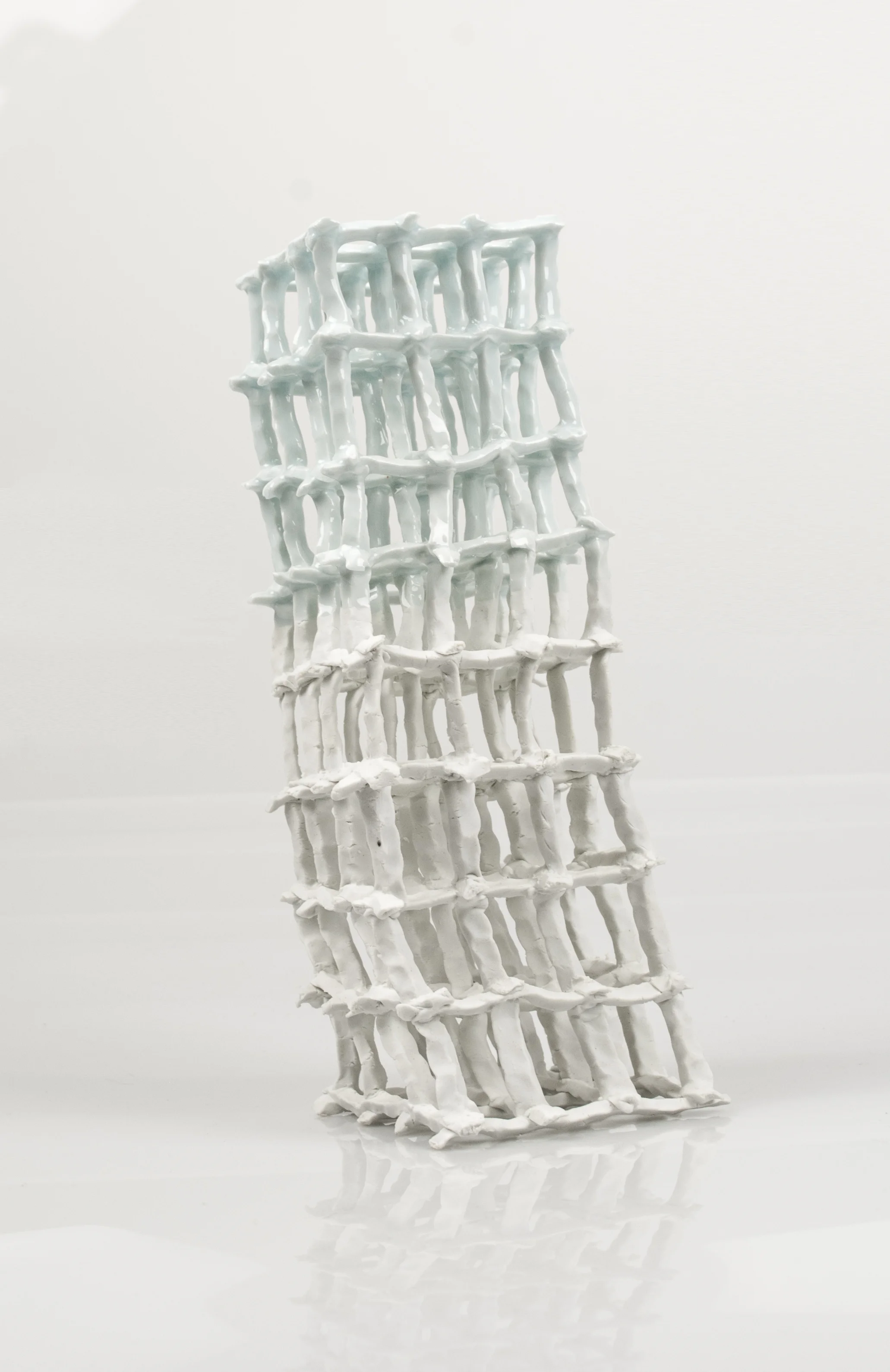 White and Blue Porcelain and glaze 4 x 4 x 12 $ 400