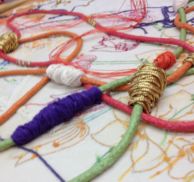 Above is a detail of a work in progress in my studio today! Please look at the image below for an artwork I finished 2 years ago…. notice the stitchwork and the little ceramic conduettes … they look the same as the collection of threads or string on the cording above. Very interesting, but mostly fun.