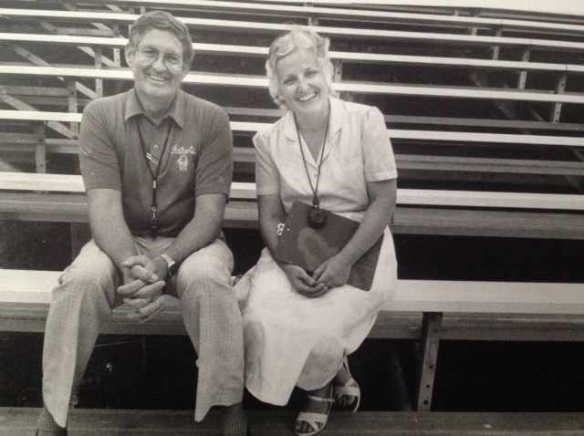 DAD AND MOM ON BLEACHERS My mother and father, Joanna and Nelson Moore, at Lincoln County High School in Stanford, Kentucky, around 1987. Mom was the classic coach's wife, supporting my dad as he was the head boy's basketball coach, boy's and girl's tennis coach and cross country coach. Mom was always there in the background, supporting both him and our family, every single day.