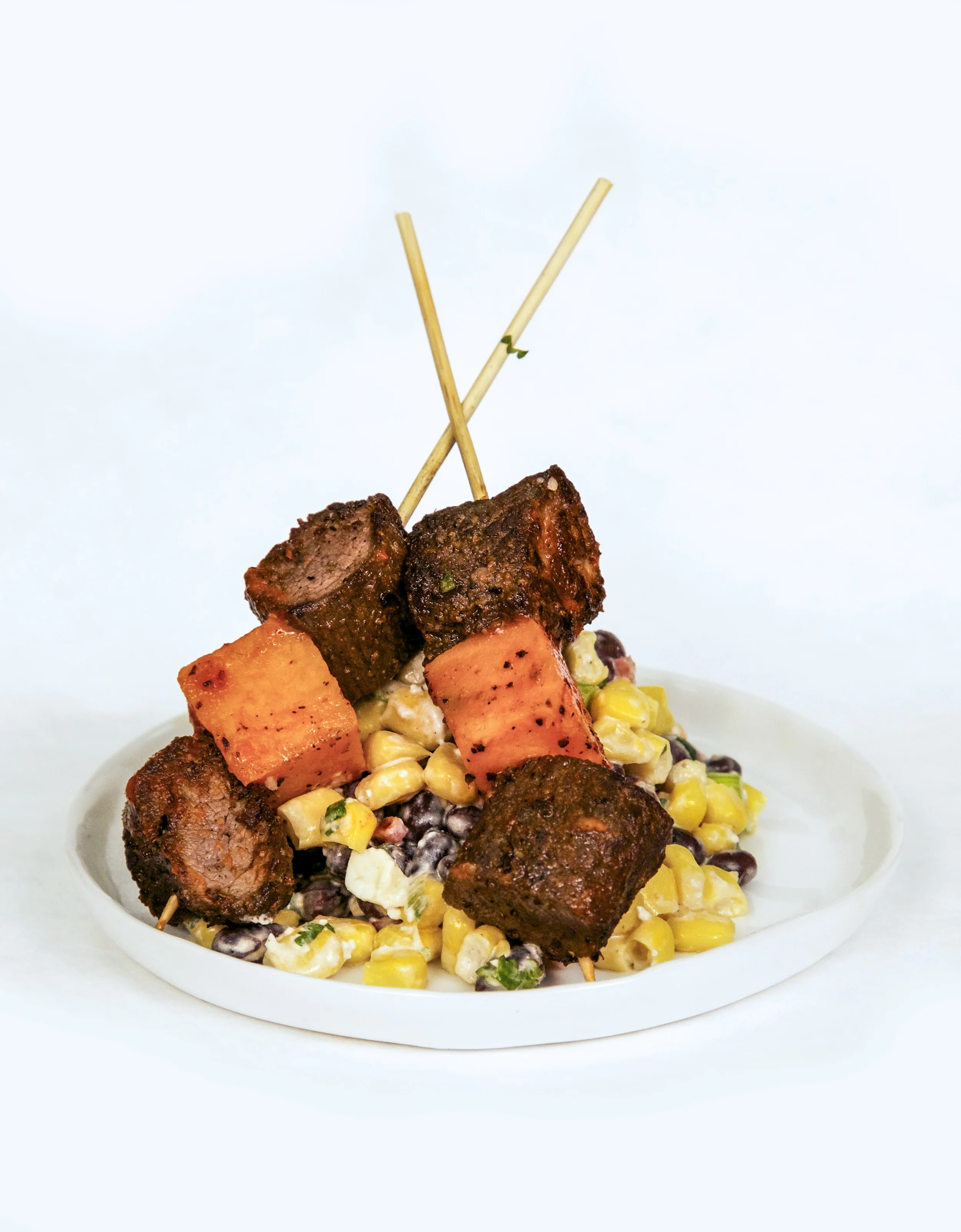 Chili Seared Filet of Beef with Sweet Potatoes and Roasted Corn and Black Bean Salad.jpg