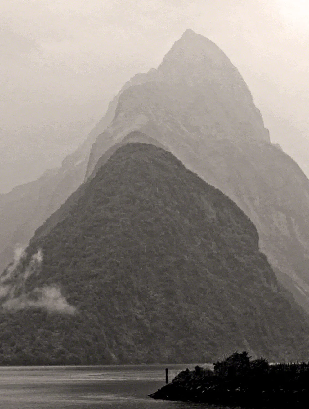 Mitre Peak, Milford Sound, New Zealand. Imaged in a postcard style.