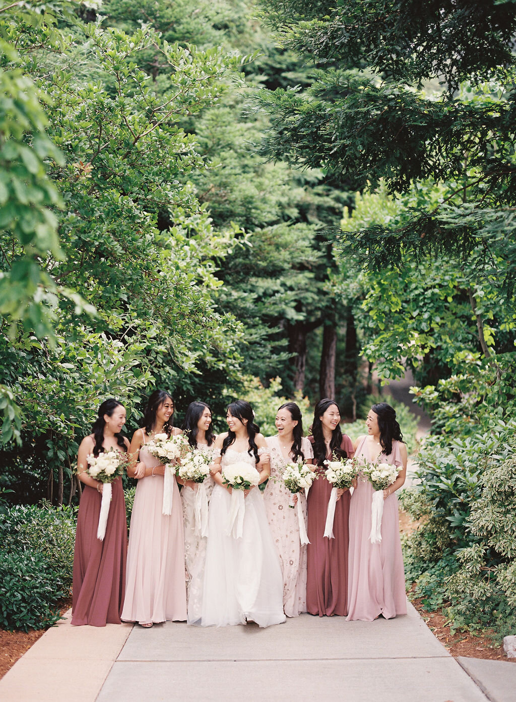 bride bridesmaids blush terra cotta dresses white bouquets redwoods